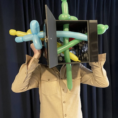 BALLOONS THRU HEAD CHEST